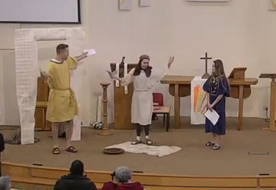 The lame beggar gets up from his mat and rejoices after being healed by the apostle Peter